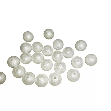 Rusztikus felületű, fehér színű, 10 mm-es fűzhető gyöngy. Furat: 1 mm.  25 db/csomag