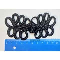   Kész paszomány gombolás 117 mm x 48 mm fekete színben.  100 db / csomag
