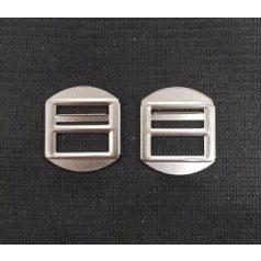   Mellény vagy nadrágcsat bújtató  20 mm fém, ezüst színű. 25 db/cs