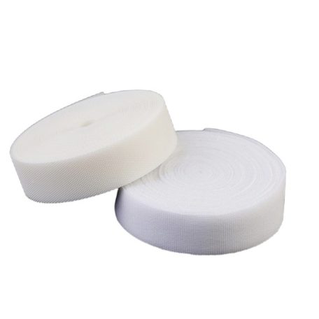 Puha tépőzár varrható. Kis profilú kampós + plüss rész. Fehér vagy fekete színben.  45 m / tekercs.  Gyerek tépőzár.