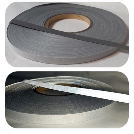 Varrható fényvisszaverő szalag 15 mm ezüst színű felvarrható csík.  5 méter/kiszerelés