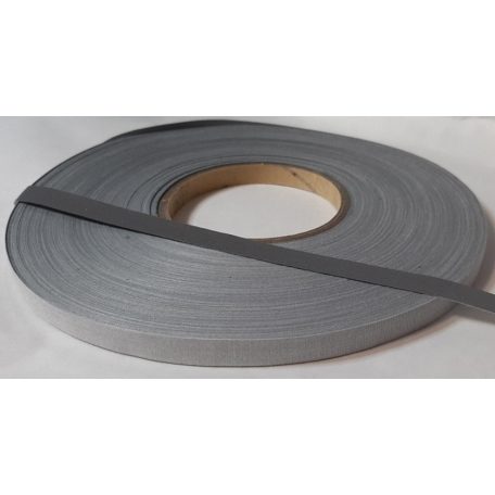 Varrható fényvisszaverő szalag 15 mm ezüst színű felvarrható csík.  5 méter/kiszerelés