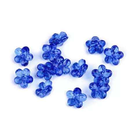 Virág alakú 12 mm-es műanyag alul varrós gomb 5 gr / csomag  1 csomagban 14 gomb található.  Királykék színben