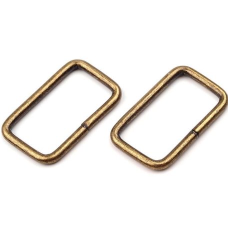 Szíjbújtató fémkellék szögletes 25 mm-es ezüst vagy antik. ( 25 db/cs) Nem zárt. 